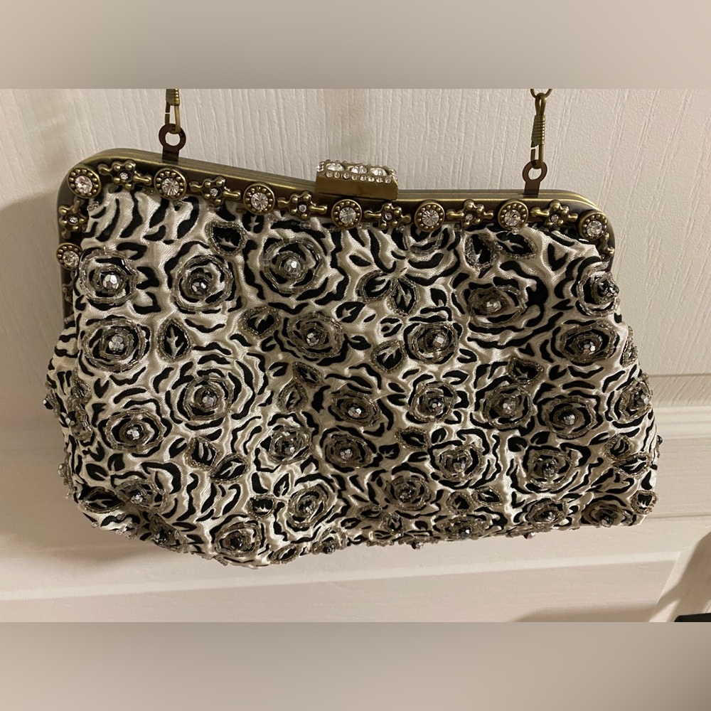 Elegant Black and Cream Floral Clutch